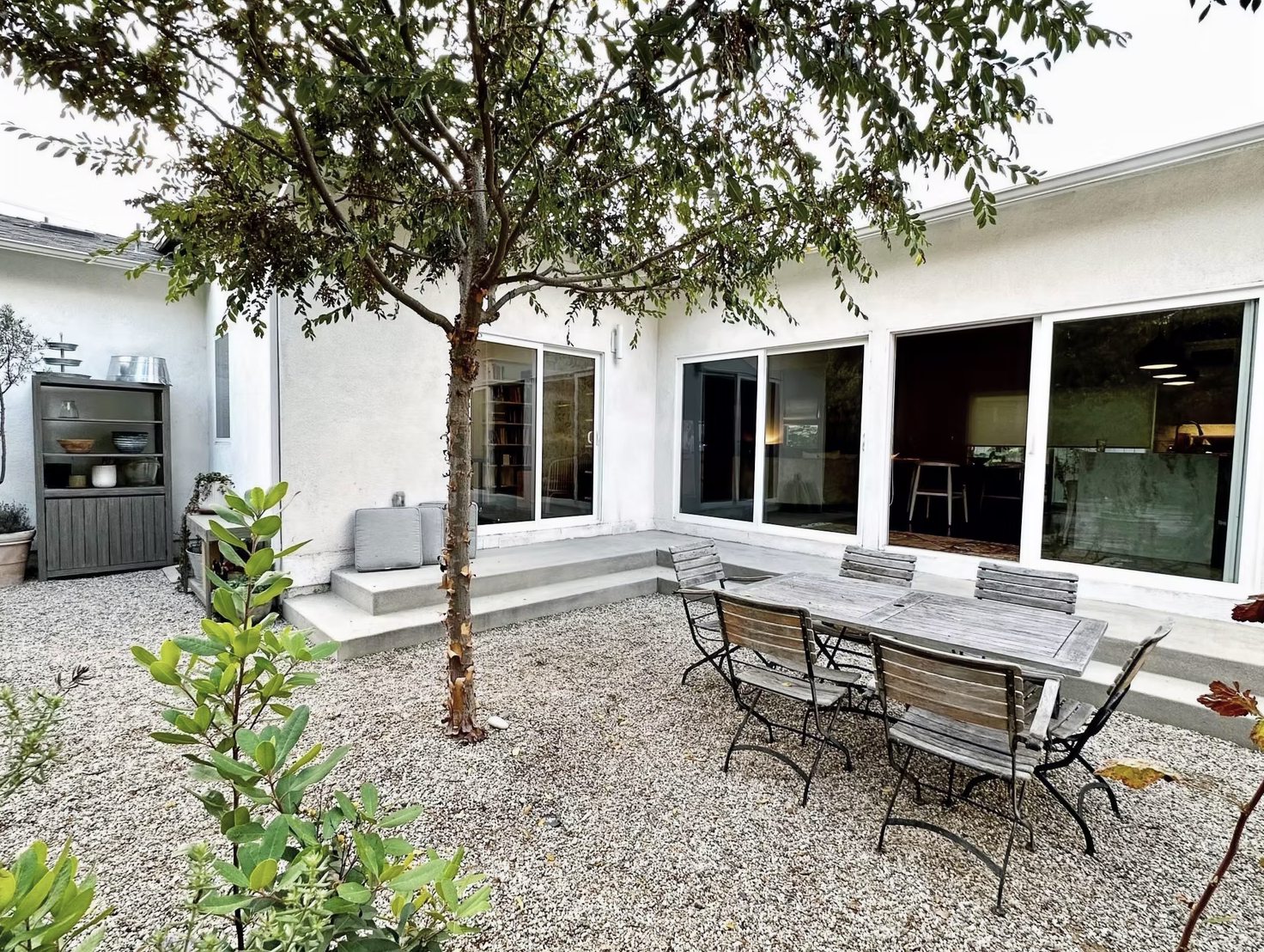 A garden space with native plantings and outdoor seating